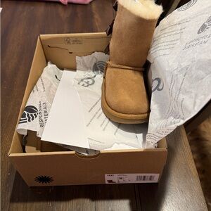 UGG Tan Sheepskin Boots with Ribbon Detail